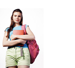 Image showing young cute teenage girl posing cheerful against white background with books and backpack isolated copyspace