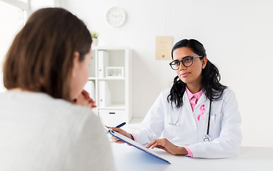 Image showing doctor with pink awareness ribbon and patient