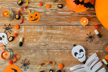 Image showing halloween decorations with space on wooden boards