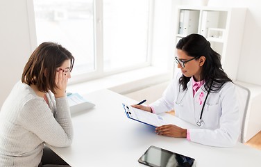 Image showing doctor with pink awareness ribbon and patient