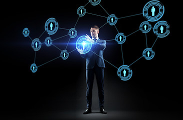 Image showing businessman with virtual network contacts