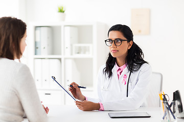 Image showing doctor with pink awareness ribbon and patient