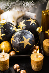 Image showing Christmas balls with candles 