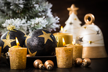 Image showing Christmas balls with candles 