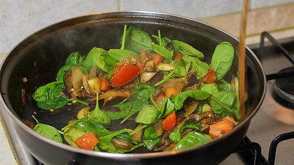 Image showing Preparing hot breakfast