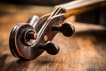 Image showing Violin in vintage style on wood background