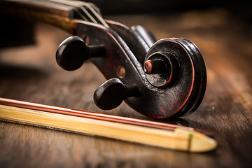 Image showing Violin in vintage style on wood background