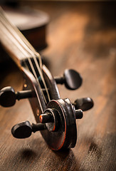 Image showing Violin in vintage style on wood background