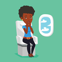 Image showing Young woman suffering from fear of flying.