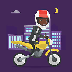 Image showing African-american man riding motorcycle at night.