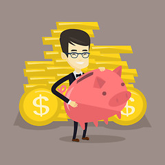 Image showing Business man holding big piggy bank.