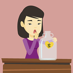 Image showing Bankrupt woman looking at empty money box