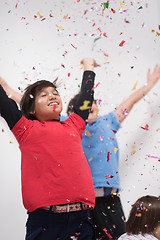 Image showing kids  blowing confetti