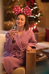 Image showing woman drinking champagne at spa