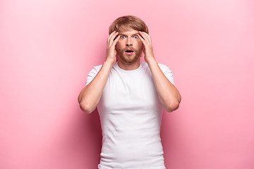 Image showing Portrait of young man with shocked facial expression