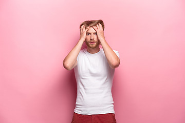 Image showing Portrait of young man with shocked facial expression