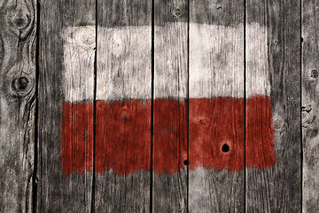 Image showing flag of poland on aged wooden wound