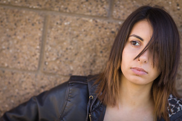 Image showing Beautiful Meloncholy Mixed Race Young Woman Portrait Outside.