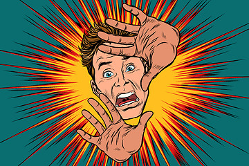 Image showing Scared man covered with hands