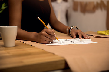 Image showing Making some fashion sketches