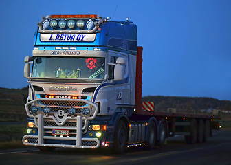 Image showing Customized Scania Semi Trucking at Dusktime