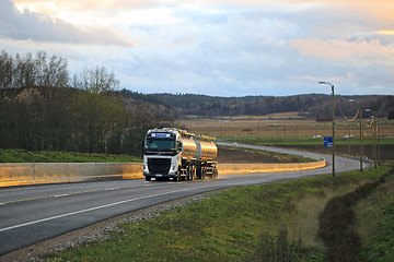 Image showing White Volvo FH Tanker Trucking at Sunset