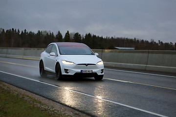 Image showing White Tesla Model X Electric Car on Evening Road