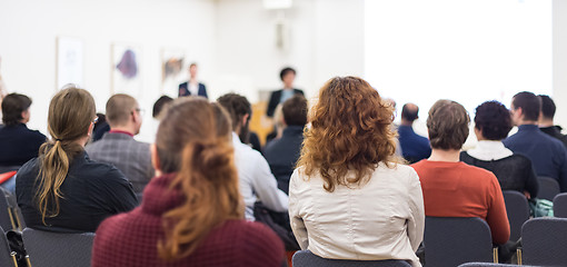 Image showing Woman giving presentation on business conference.