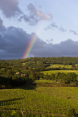 Image showing Evening landscape with rainbow. Tuscany, Italy