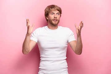 Image showing Portrait of young man with shocked facial expression