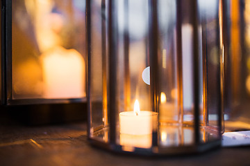 Image showing close up of lantern with candle burning inside