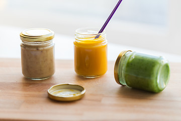 Image showing vegetable or fruit puree or baby food in jars