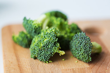 Image showing close up of broccoli on wooden cutting board