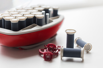 Image showing hot rollers kit on table with hair clips