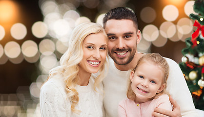 Image showing happy family at home with christmas tree