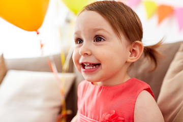 Image showing happy baby girl on birthday party at home