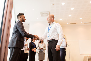 Image showing handshake of people at business conference