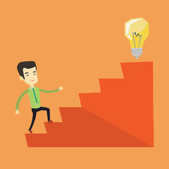 Image showing Business man walking upstairs to the idea bulb.