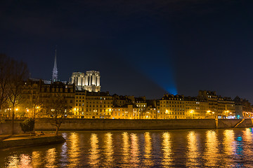 Image showing Bridge by the Seine river in Paris at night