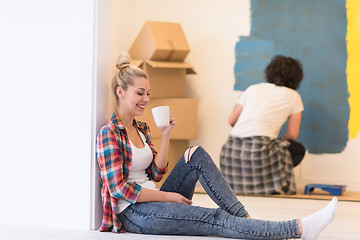 Image showing young couple doing home renovations