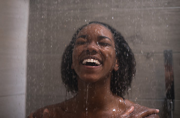 Image showing African American woman in the shower