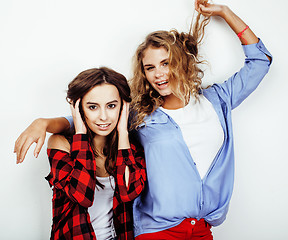 Image showing best friends teenage girls together having fun, posing emotional on white background, besties happy smiling, lifestyle people concept close up. making selfie