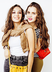 Image showing best friends teenage girls together having fun, posing emotional on white background, besties happy smiling, lifestyle people concept close up. making selfie