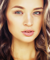 Image showing young sweet brunette woman close up isolated on white background