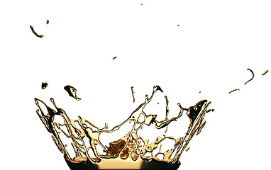 Image showing Liquid gold or oil splatter and splashes isolated on white
