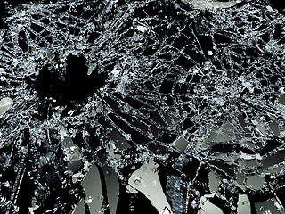 Image showing Damaged or broken glass on black 