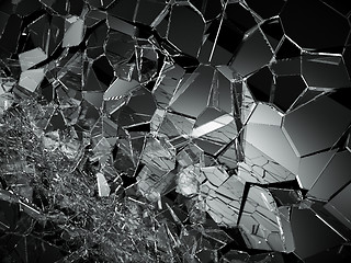 Image showing Pieces of destructed Shattered glass on black