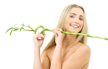 Image showing happy blonde with bamboo