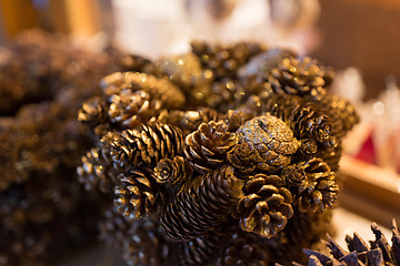 Image showing close up of gilded cone christmas decoration