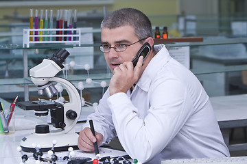 Image showing Researcher using a mobile phone